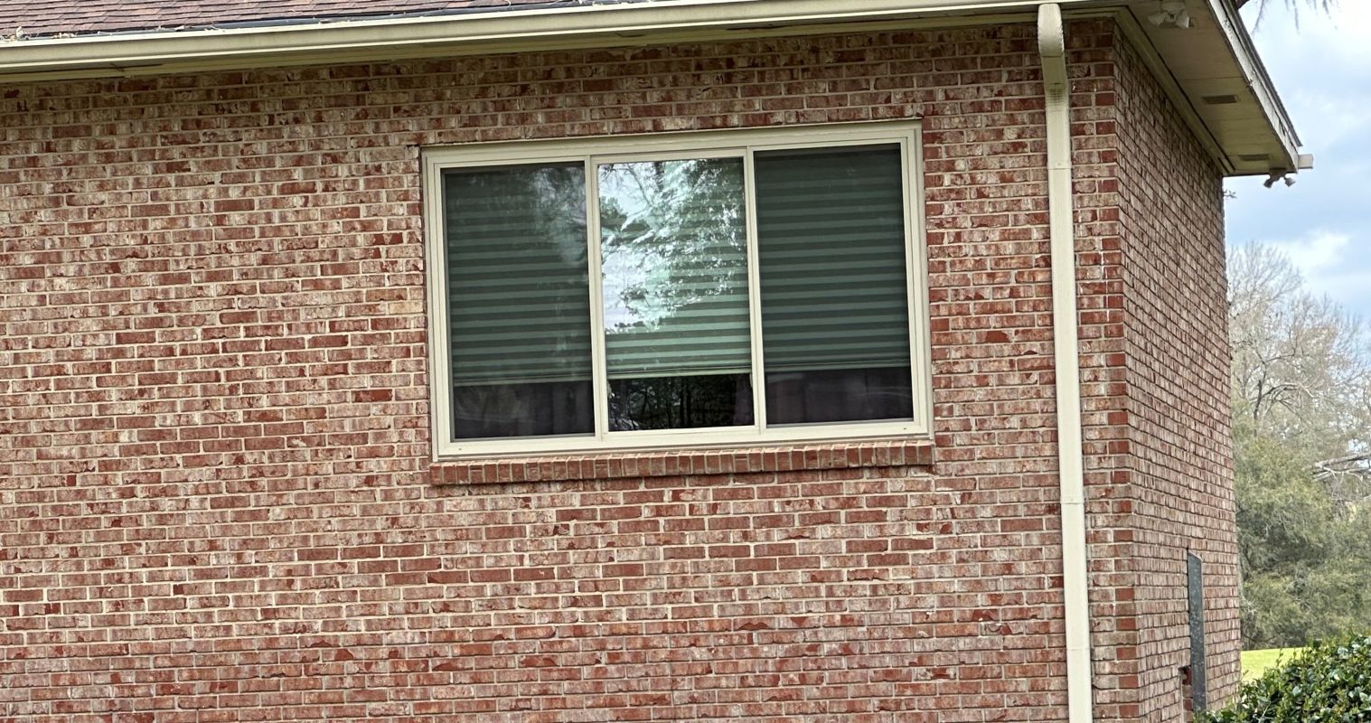 Beige 3-lite slider in light brick