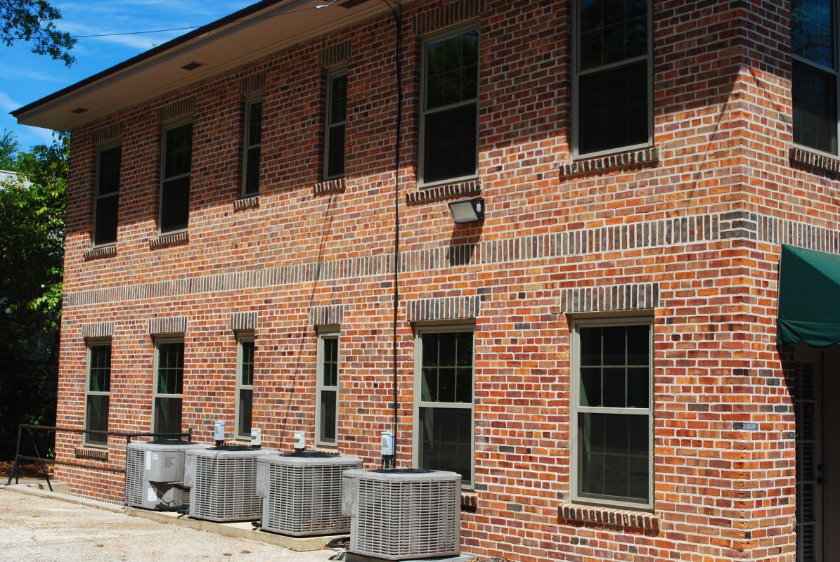 Historic commercial building back view with clay windows