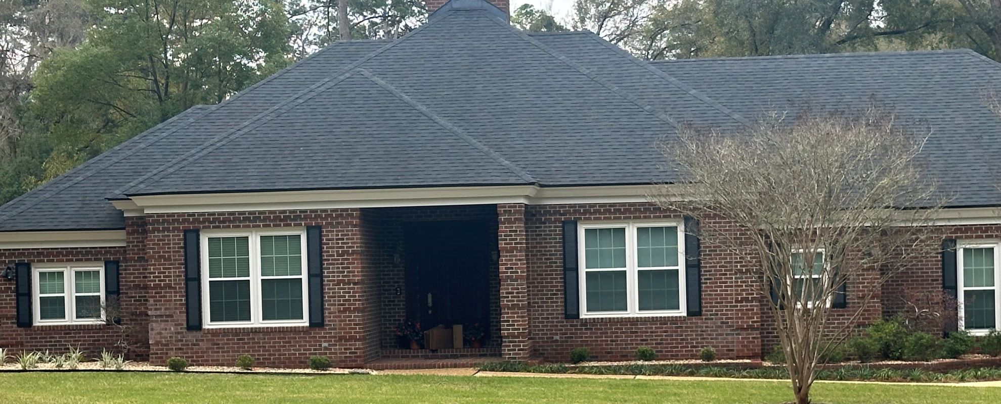 White windows with dark brick