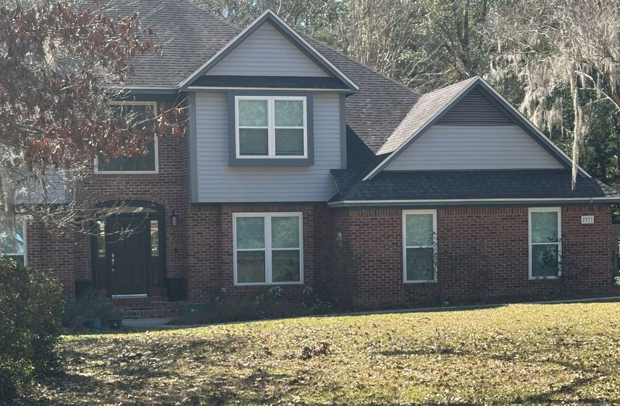 white windows with dark red brick